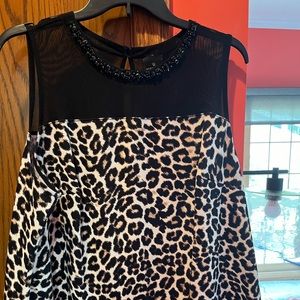 Leopard shell with beaded trim